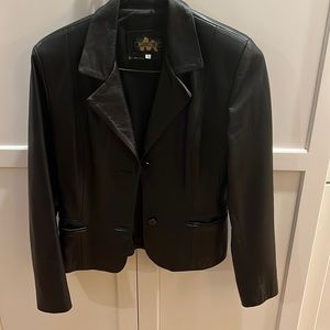 Italian made leather blazer, lightly used, large but fits to a medium/small